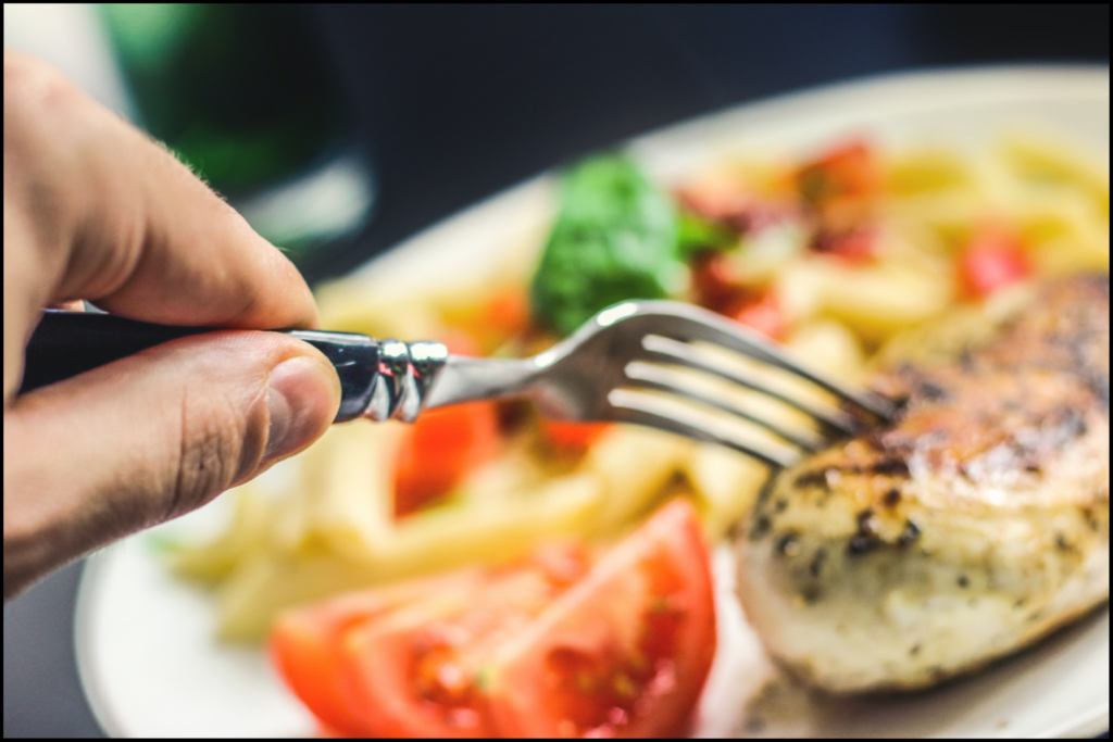 A person holding a fork